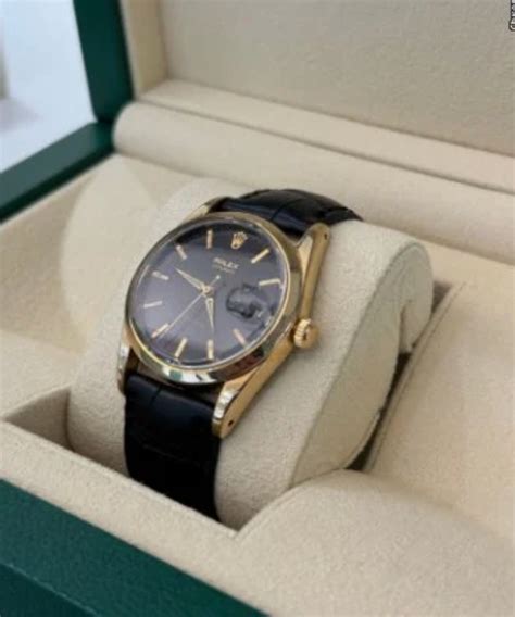 rolex oysterdate precision in oro con quadrante nero